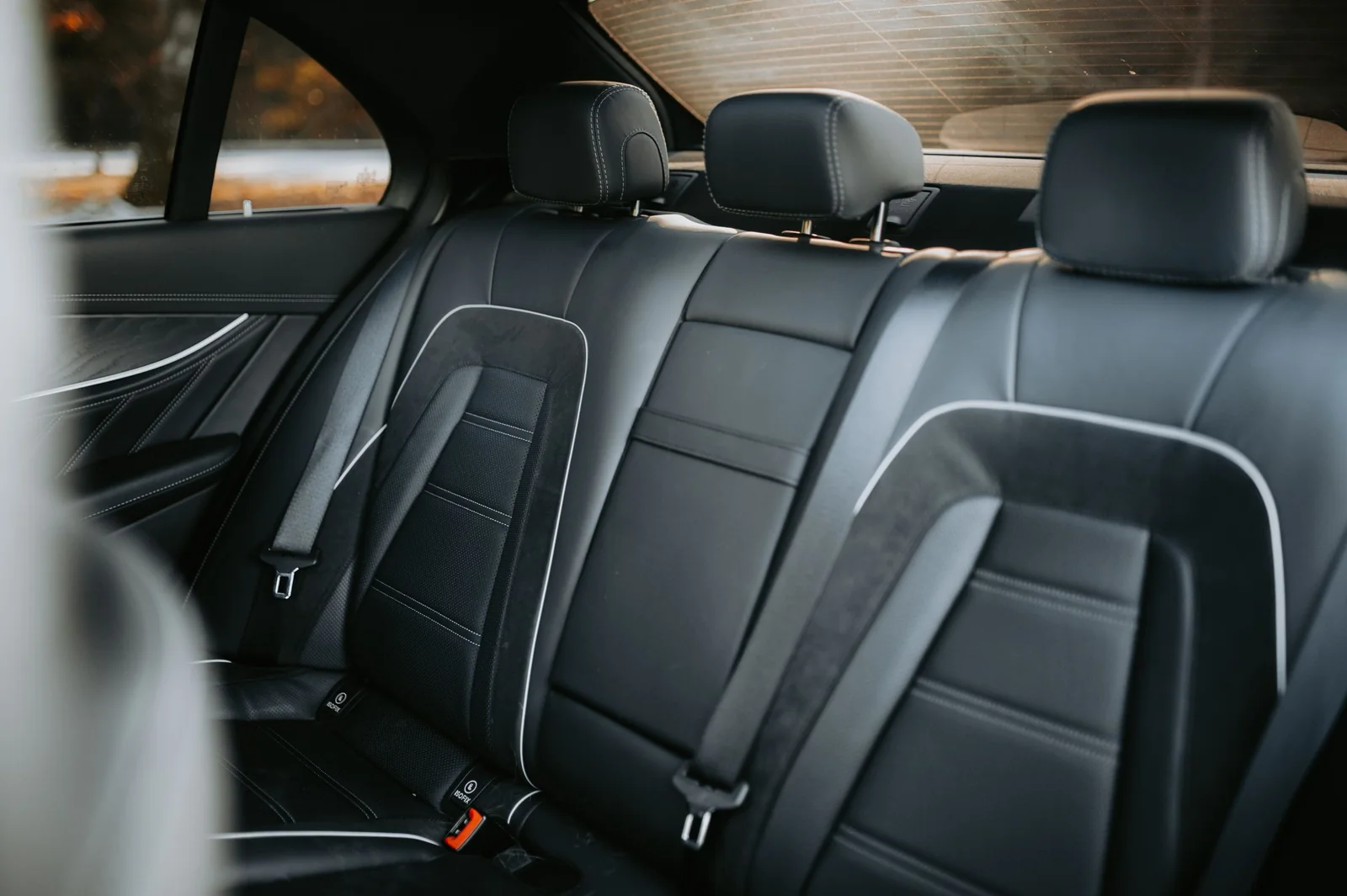 A car’s black leather back seats